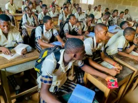 Secondary students studying in class