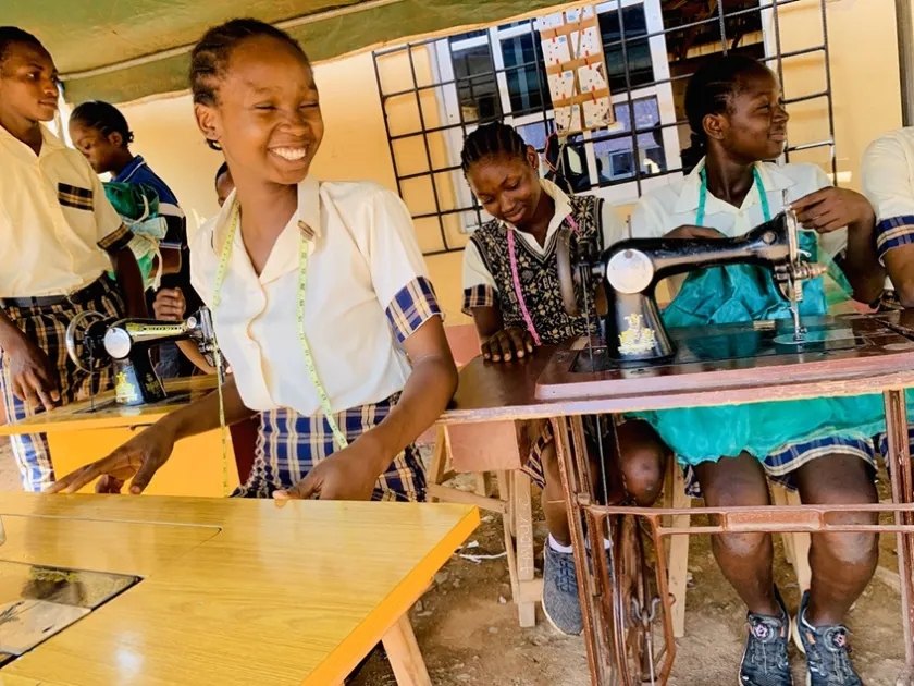 Students gaining practical skills in the tailoring workshop